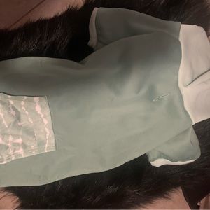 NWOT a Dog sage green hoodie with tie dye pocket pouch. Size M